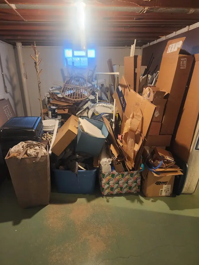 Roll-off dumpster container at job site for 15 Yard Dumpster Rental in Dilworth